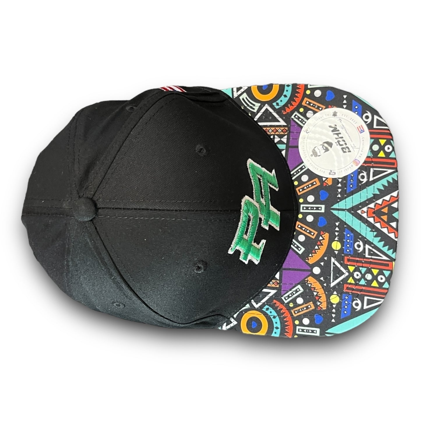 Green Crispy PR Logo on Black Cap with Colorful Geometric Pattern Visor, and Puerto Rico Flag