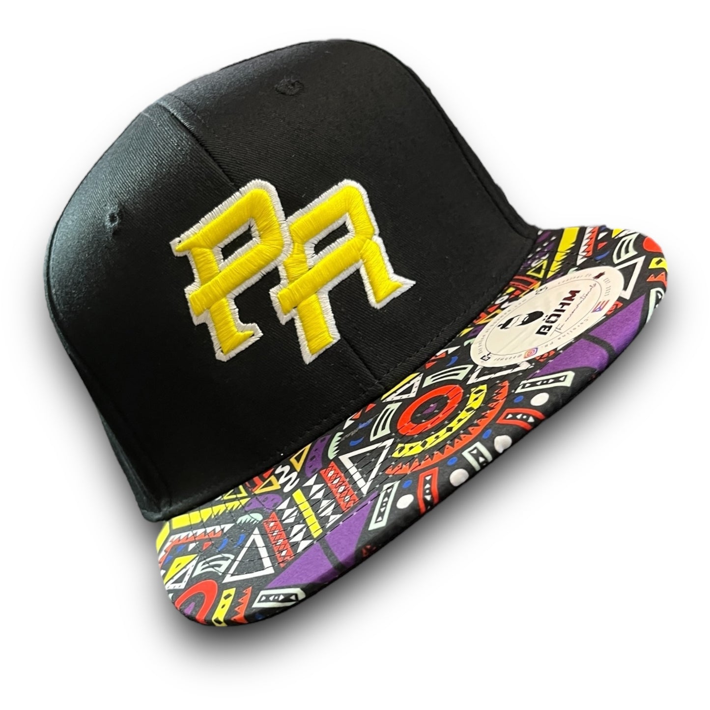 Yellow Crispy PR Logo on Black Cap with Colorful Geometric Pattern Visor, and Puerto Rico Flag