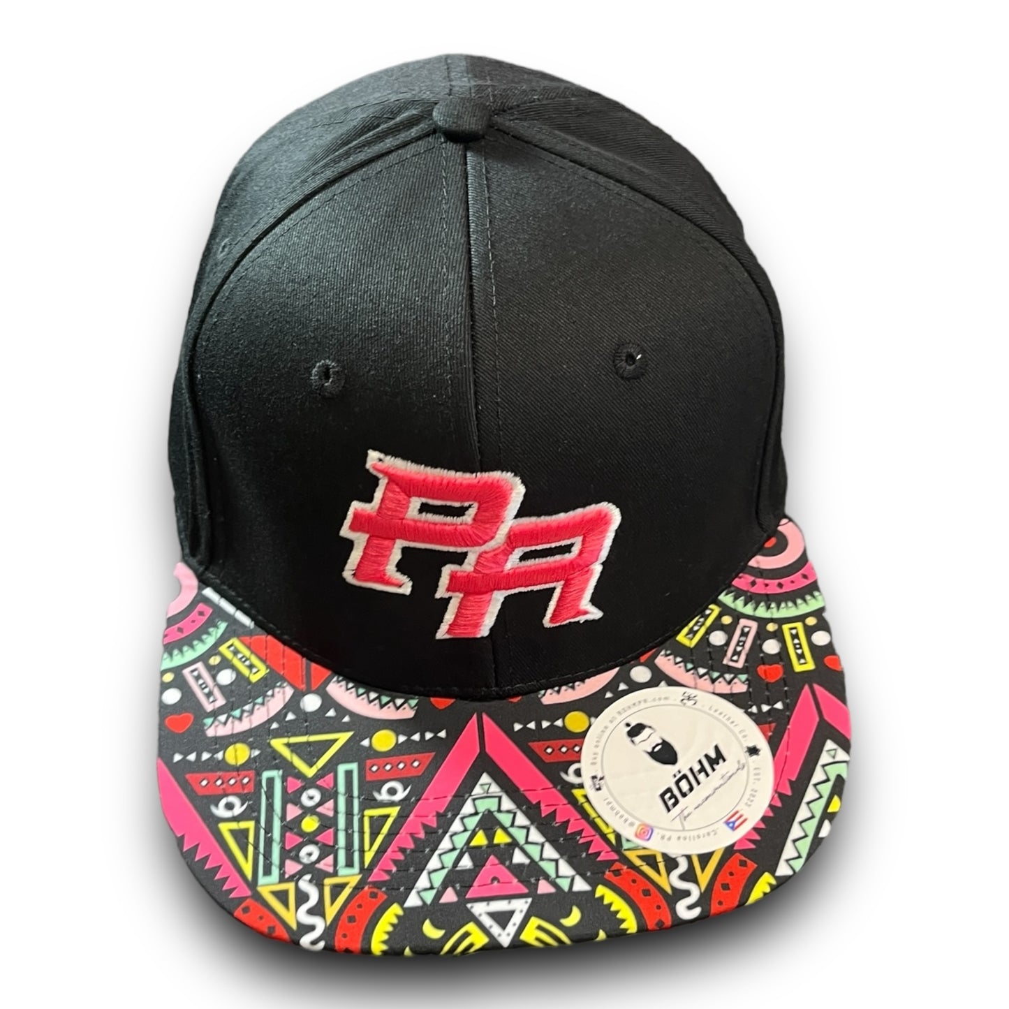 Pink Crispy PR Logo on Black Cap with Colorful Geometric Pattern Visor, and Puerto Rican Flag