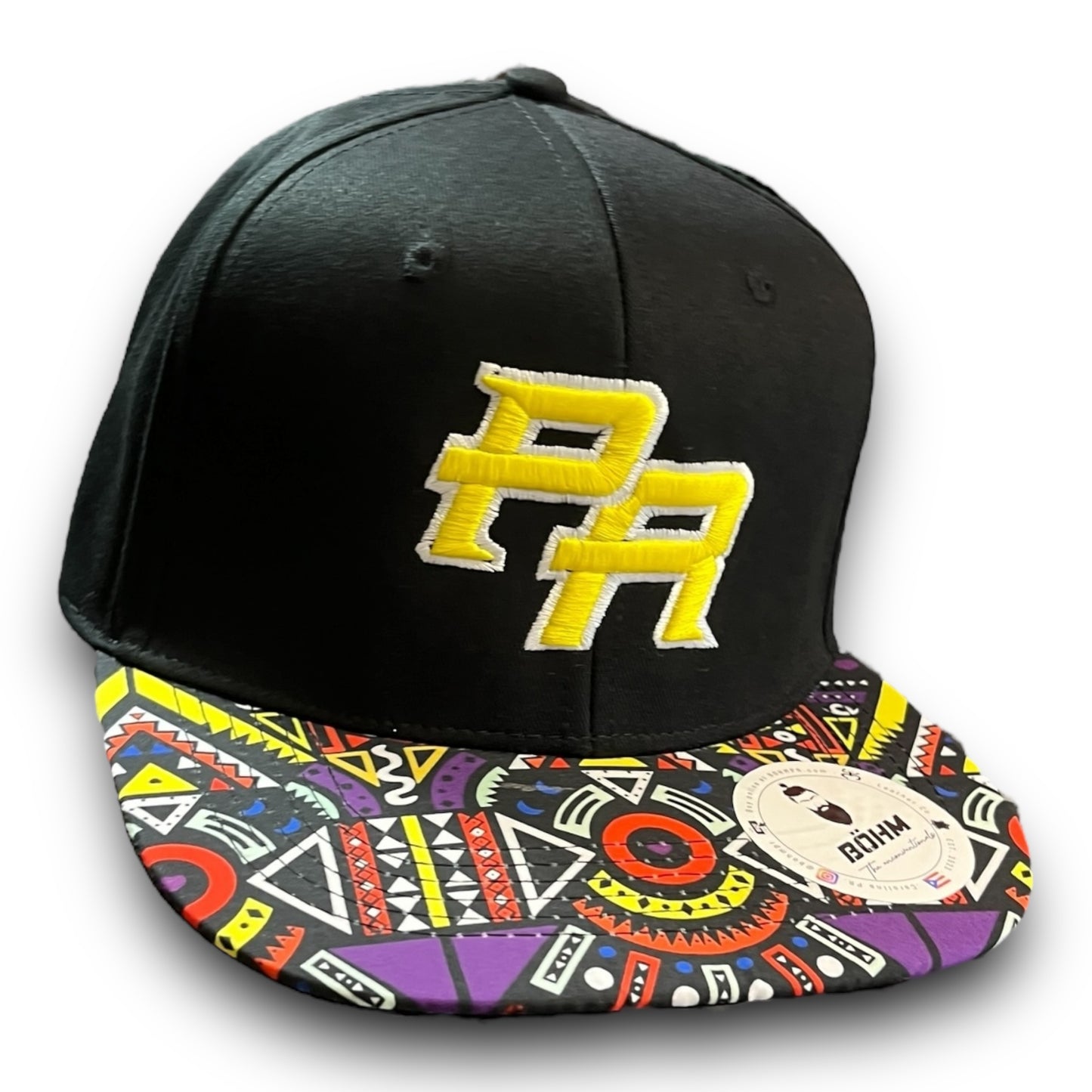 Yellow Crispy PR Logo on Black Cap with Colorful Geometric Pattern Visor, and Puerto Rico Flag